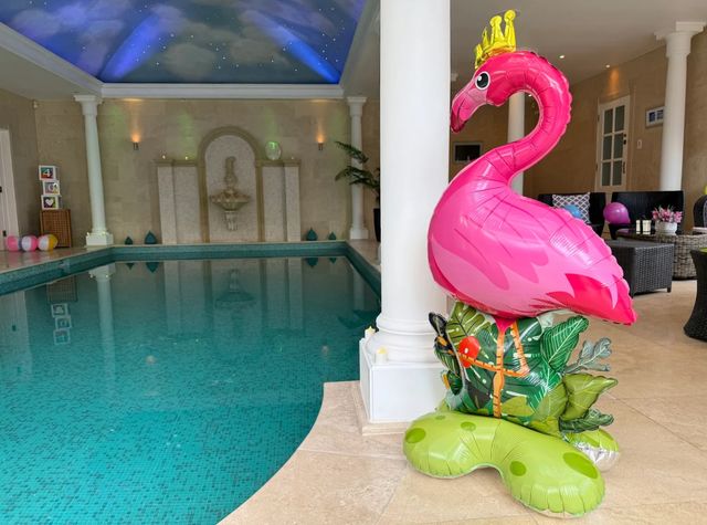 Guests celebrating in the private heated pool with Jacuzzi