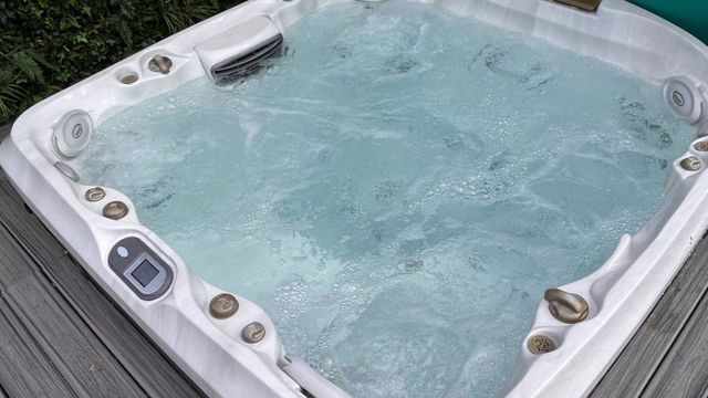 The outdoor heated Jacuzzi at The Willows Spa
